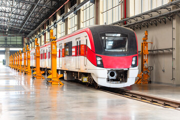 Electric train stops at maintenance facility. Red Line train Bang Sue Grand Station in Bangkok,...