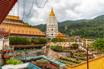 Kek Lok Si Temple on Penang Island. It is hilltop temple complex characterized by colorful, intricate decor and many Buddha images - obrazy, fototapety, plakaty