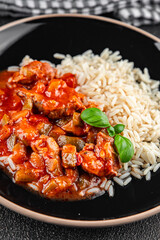 meat with rice chicken Basque tomato sauce tasty fresh eating cooking appetizer meal food snack on the table copy space food background rustic top view