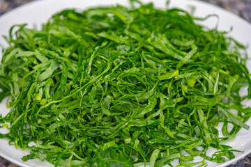 Kale leaves chopped and sliced into thin strips