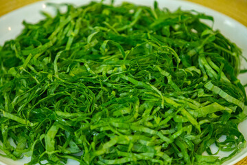 Kale leaves chopped and sliced into thin strips