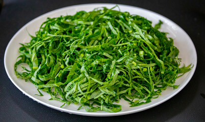 Kale leaves chopped and sliced into thin strips