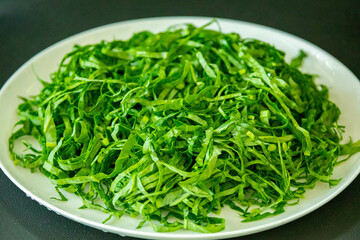 Kale leaves chopped and sliced into thin strips