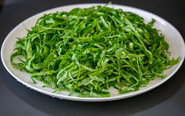 Kale leaves chopped and sliced into thin strips