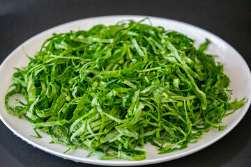 Kale leaves chopped and sliced into thin strips