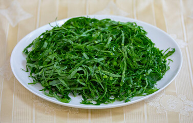 Kale leaves chopped and sliced into thin strips