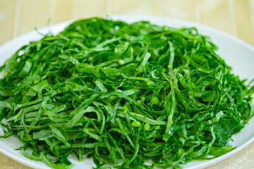 Kale leaves chopped and sliced into thin strips