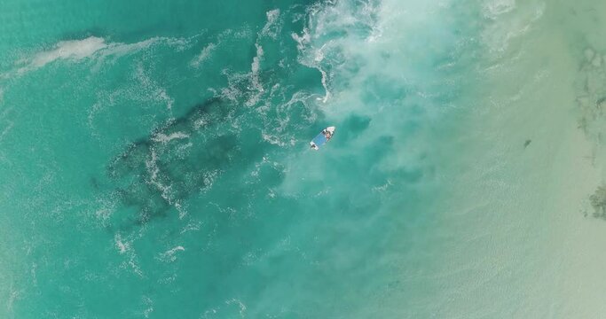 Aerial footage of the Orot Rabin power station in Hadera. Fishing boats surrounded by friendly sharks that come every winter to the warm waters emitted from the