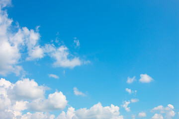 Bright sky background with few clouds.