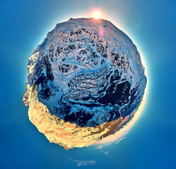 Breathtaking panoramic aerial 360 panorama little planet view on Snow Alps - winter mountain peaks around French Alps mountains, The Three Valleys: Courchevel, Val Thorens, Meribel, France