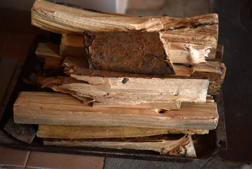 Chopped firewood. Wooden firewood for kindling the stove. Wood fuel.