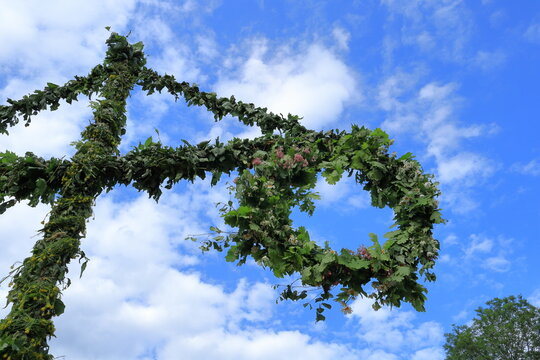 Swedish maypole for midsummer tradition. Close up and isolated. Stockholm, Sweden.