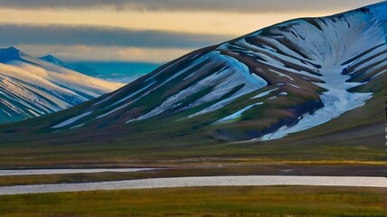 Nestled within a picturesque landscape, a serene lake reflects the beauty of its surroundings. Surrounded by towering trees and rolling hills, the tranquil waters invite contemplation and reflection