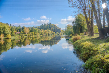 Beautiful views of the autumn river Berounka, forest and mountains, Czech.