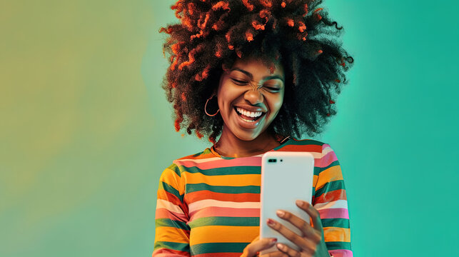 Beautiful Black Woman With Afro Hair Holding Mobile Phone, Isolated On Emerald Green Background