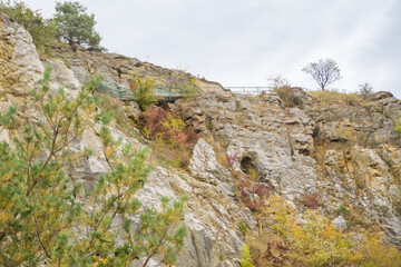 Fototapeta na wymiar Beautiful view of mountains and rocks on an autumn day near a Konepruske Caves,