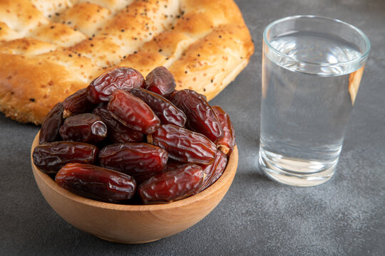 Traditional iftar table with dates fruit,olive and ramadan pita