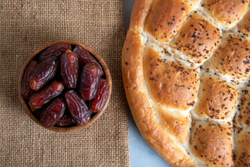 Date fruits and traditional Ramadan pita,top view

