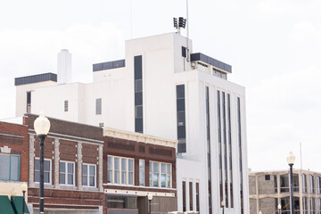Independence, Missouri, USA - June 16, 2023: Afternoon sunlight shines on the historic core of downtown Independence.