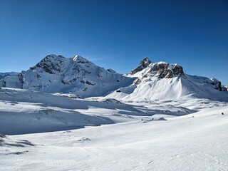 View of the Ortstock mountain in the Braunwald ski area in the Glarus Alps. Ski mountaineering in beautiful Switzerland.