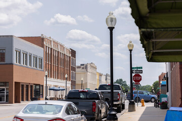Fototapeta na wymiar Independence, Missouri, USA - June 16, 2023: Afternoon sunlight shines on the historic core of downtown Independence.