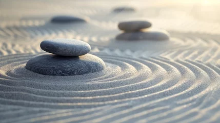 Foto op Canvas A peaceful Zen garden with smooth stones and raked sand on a soft grey background. © furyon