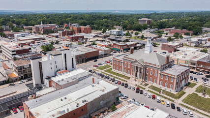 Independence, Missouri, USA - June 16, 2023: Afternoon sunlight shines on the historic core of downtown Independence.
