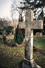 Old Stone Cross - Grave -  Graveyard - Scary - Cemetery - Halloween - Mysterious  - Tombstones - Background - Concept - Religion - Spooky - Creepy 