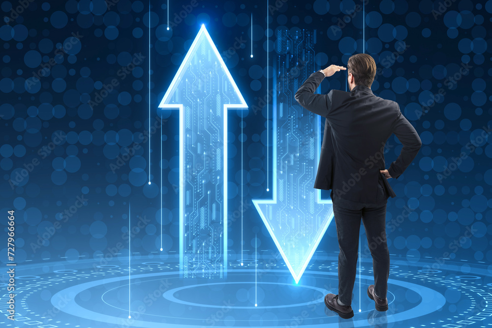 Poster back view of young businessman looking at abstract up and down arrows on dark blue background. the c