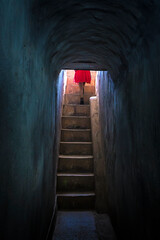 Red dress climbing upstairs 