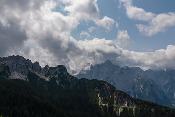 Scenic view of mountain peak Jof Fuart in untamed Julian Alps seen from summit Cima del Cacciatore, Monte Santo di Lussari, Friuli-Venezia Giulia, Italy. Wanderlust in remote Italian Alps in summer