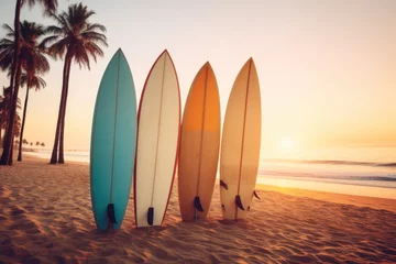 Fotobehang Surfboards on the beach at sunset. Vintage filter effect. Surfboards on the beach. Vacation Concept with Copy Space. © John Martin