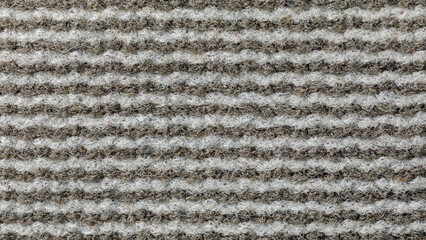 Close up of white and gray striped felt nylon fabric texture. Horizontal photo