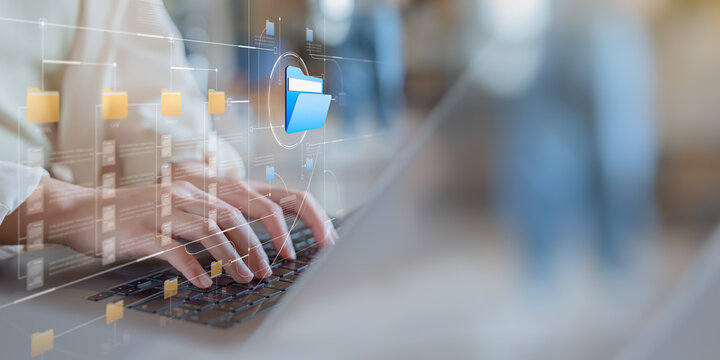 Businesswoman working on laptop with digital document, Security in accessing information, data search, cloud technology, Enterprise content management, Document management system and files data.