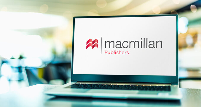 Laptop computer displaying logo of Macmillan Publishers