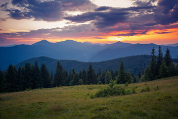 Mountain range in the morning rays of the sun. Carpathian National Park, Ukraine.