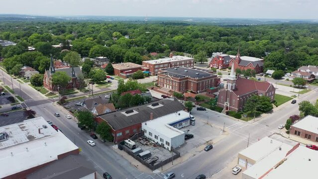 Independence, Missouri, USA - June 16, 2023: Afternoon sunlight shines on the historic core of downtown Independence.