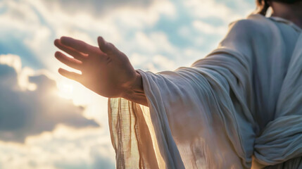 Jesus Christ in white clothes extends his hand to you against the sky as a symbol of Christianity - obrazy, fototapety, plakaty