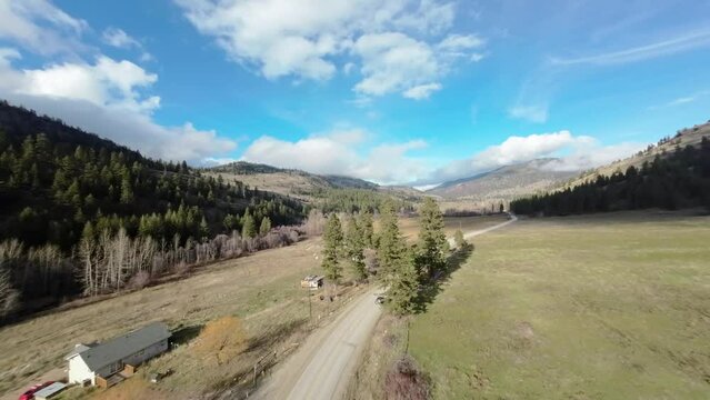 FPV drone high speed flying above the trees at Green Mountain road, British Columbia, Canada. High quality 4k footage