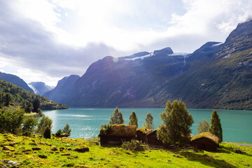 Traditional houses in Lovatnet lake valley in south Norway, Europe