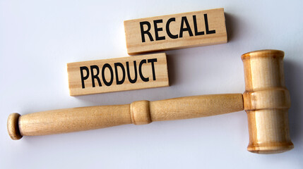 PRODUCT RECALL - words on wooden blocks on a white background with a judge's gavel.