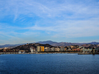 Fototapeta na wymiar Scenic European Coastal Landscape with a View of Malaga and Boats under a Summer Sky