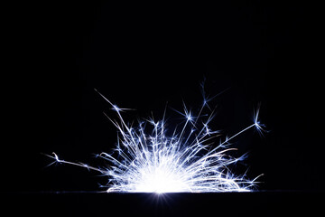 Fireworks bengal Flicker on a dark background. Easy to add lens flare effects for overlay designs...