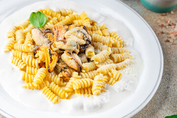 pasta mussel seafood fusilli tasty fresh eating cooking appetizer meal food snack on the table copy space food background rustic top view
