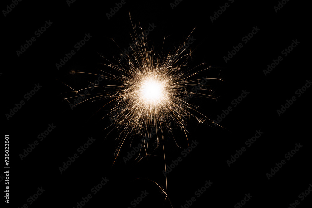 Poster Fireworks bengal Flicker on a dark background. Easy to add lens flare effects for overlay designs or screen blending mode to make high-quality images.