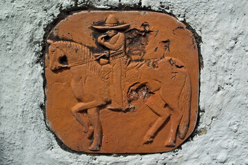 Old tile edited for modesty by chiseling off genitalia of horse , Mission San Miguel Arcángel, San Miguel, California 