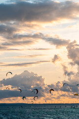 professional kite surfing on ocean or sea sunset, kitesurfing training at water