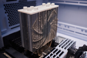 Cleaning a processor fan with a brush