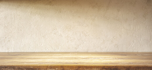 Empty Wooden Table Top With Textured Beige Wall Background in Soft Light