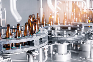 Process pasteurization of bottles on conveyor machinery of brewery. Germ removal and glass cleaning...
